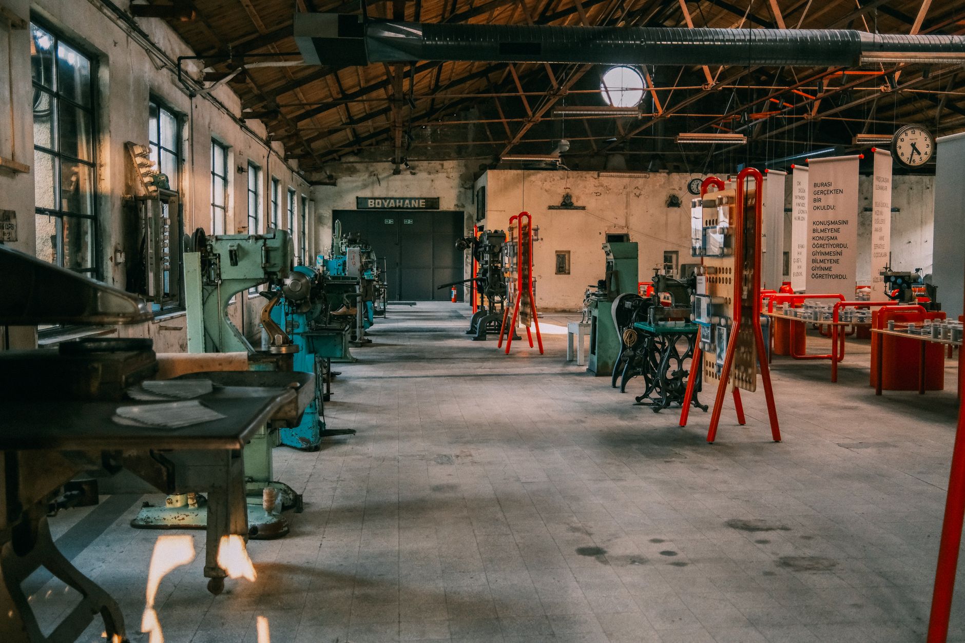 Professional roofing tools and equipment organized in a workshop, displaying proper equipment maintenance and organization standards